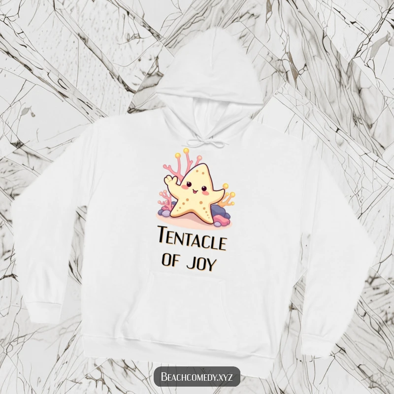 Funny starfish hoodie with a cute starfish waving a tentacle amidst glowing coral, providing warmth and ocean-themed humor.